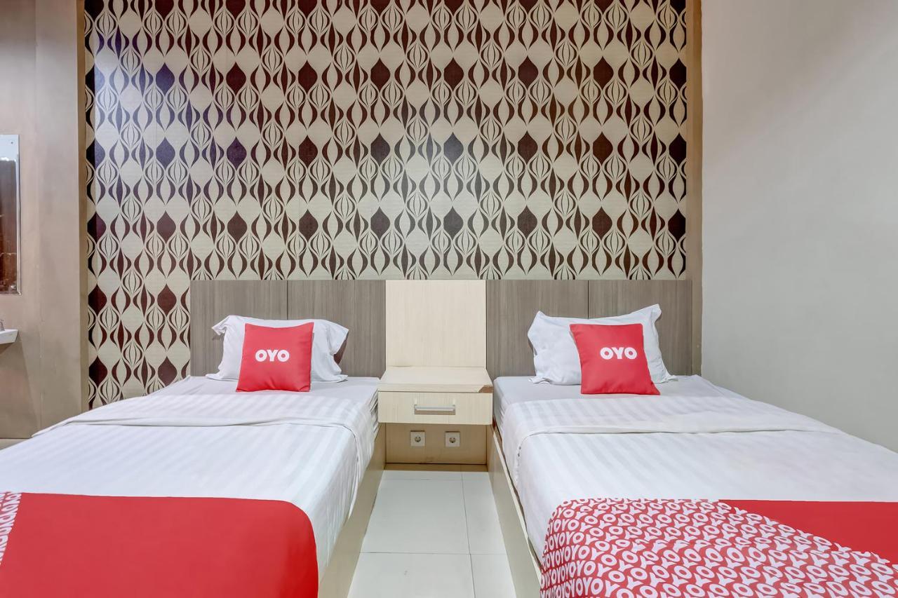 Oyo Flagship 3726 Tembok Batu Residence Tugu Extérieur photo