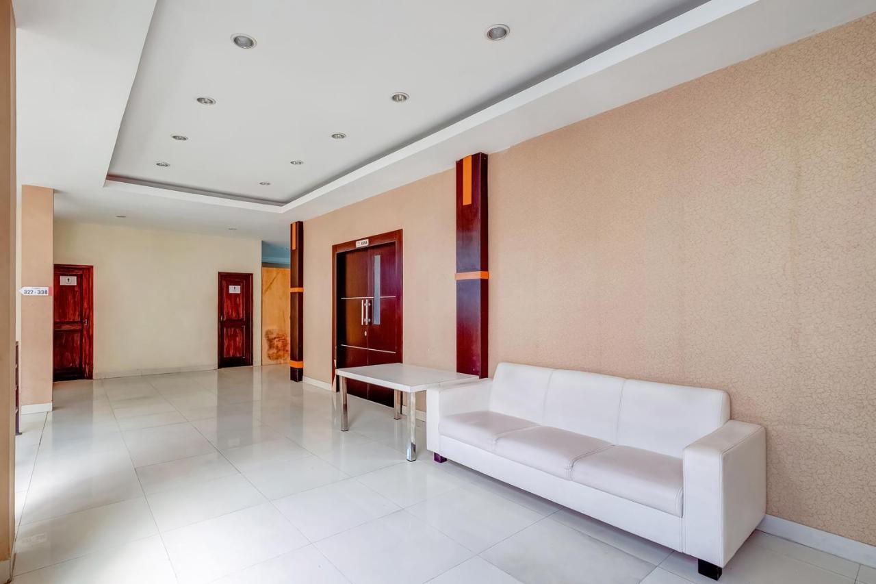 Oyo Flagship 3726 Tembok Batu Residence Tugu Extérieur photo