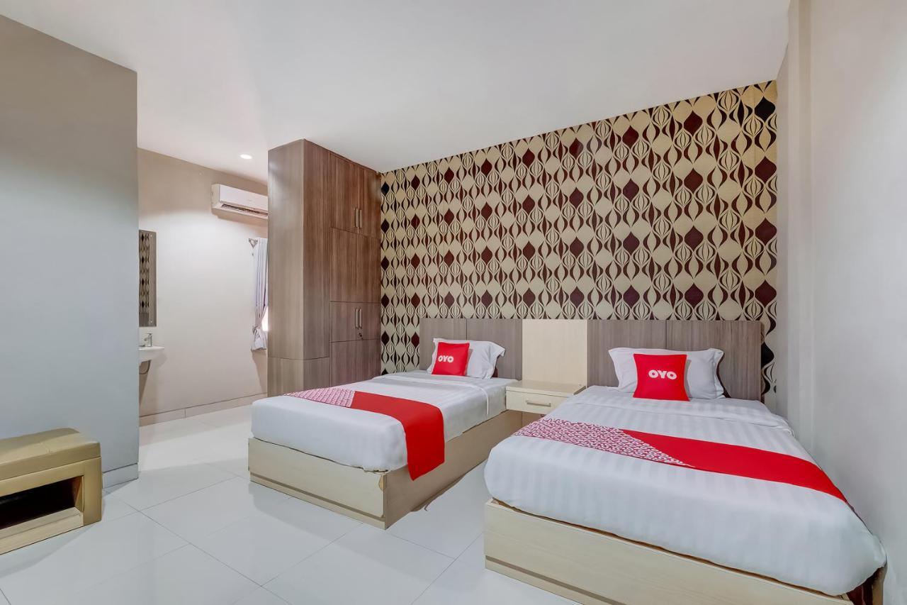 Oyo Flagship 3726 Tembok Batu Residence Tugu Extérieur photo
